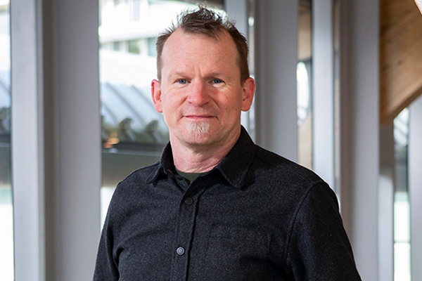Kirk McNally wins REACH Award for advocacy and activism