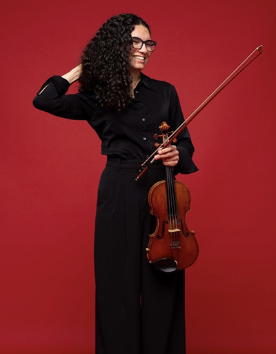 woman holding a violin