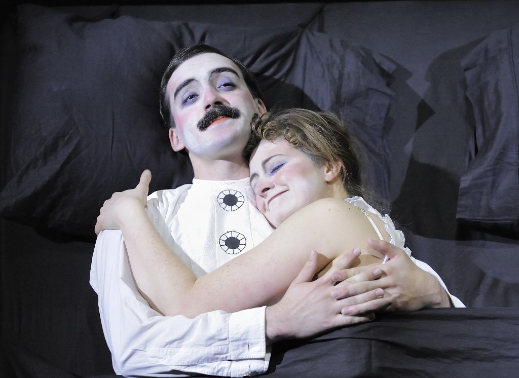 A husband (Jay Mitchell) and wife (Sarah Cody) share an embrace. Photo: David Lowes.