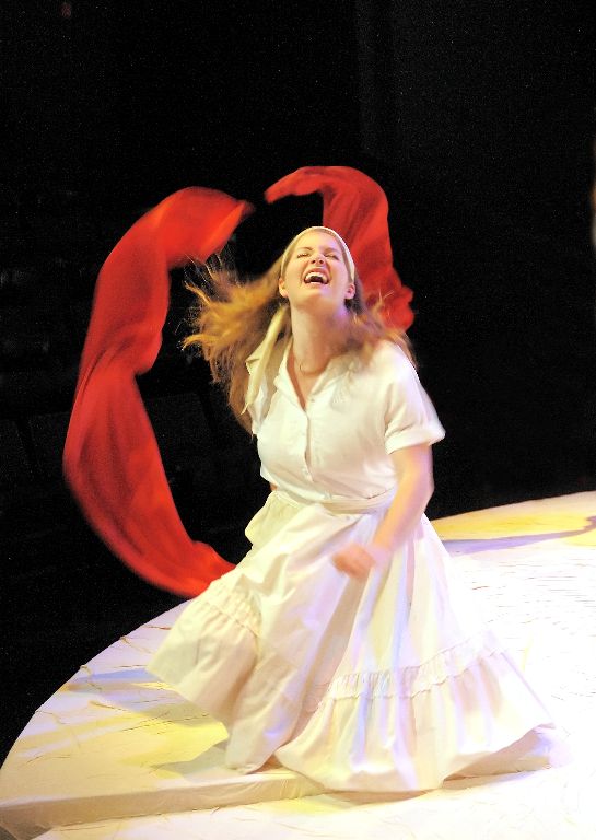 A laundress (Asia Wolfe) during the gossiping laudress's dance. Photo credit: David Lowes