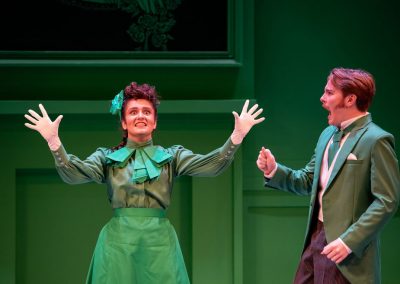 2 actors in green costumes in the importance of being earnest