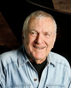 Headshot of composer for Curtains, John Kander