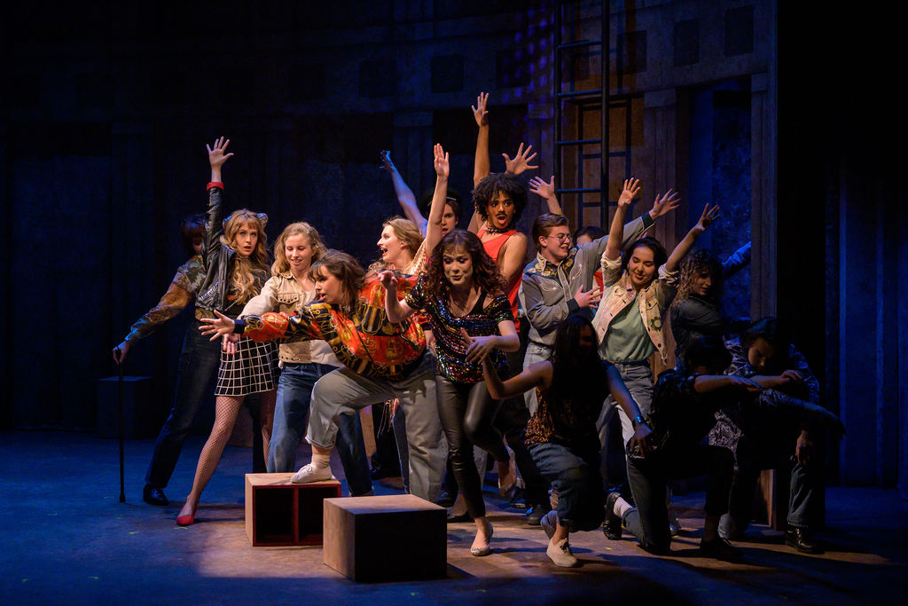The full cast of The Drowsy Chaperone dancing.